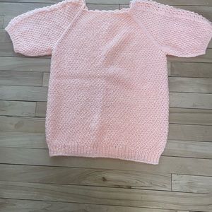 Hand knit short sleeve sweater in peachy pink